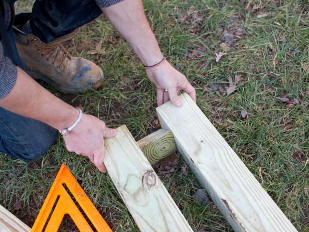Step 4a, Step 4b, Step 4c; Step 4d: Attach FootersIn order to keep vertical posts perfectly level and evenly spaced apart, footers will need to be cut and attached along the bottom of coupled 4x4s.
