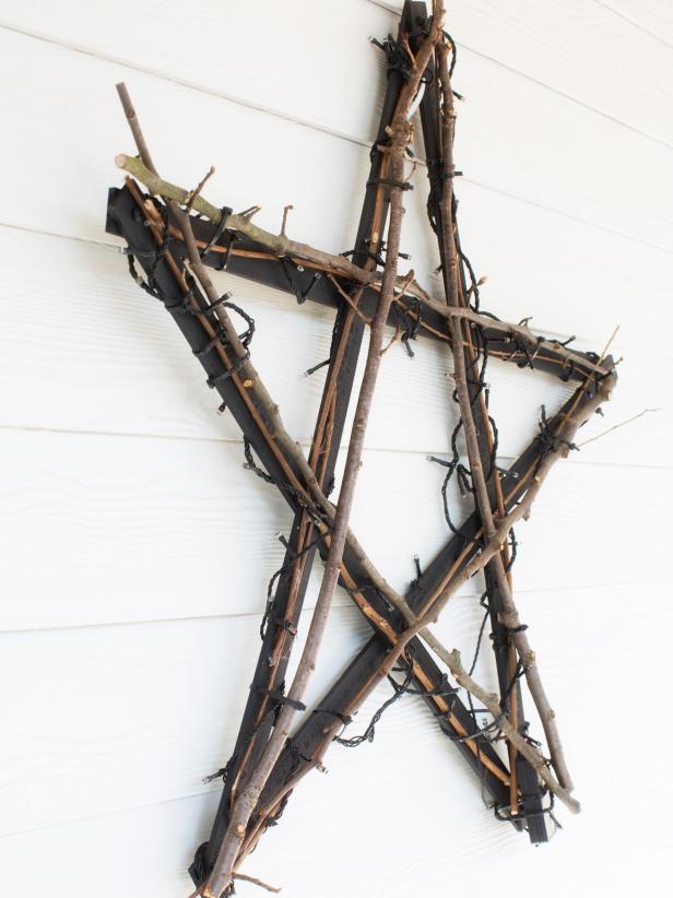 Rather than searching for a ready-made star with the proper scale and proportion, create a customized wall hanging from wooden yardsticks, spray paint, twinkle lights and twigs. <a target=&quot;blank&quot; href=&quot;http://www.hgtv.com/handmade/create-a-north-star-wall-hanging-with-yardsticks/index.html&quot;>Get the step-by-step instructions</a>.