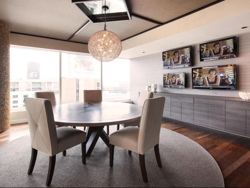 Neutral Dining Room with TVs and Crystal Chandelier