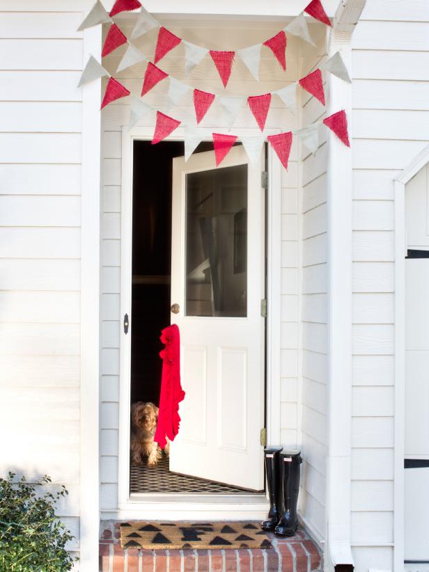 Entryway With Red and White Pennant Garland Entryway With Red and White Pennant Garland
