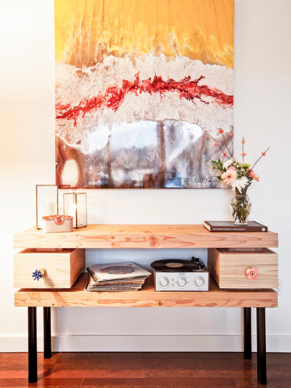 Entryway with Wood Entertainment Center Unique wood entertainment center and colorful abstract art