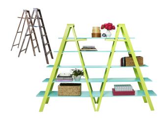Old brown ladders next to bright green and blue ladders. 