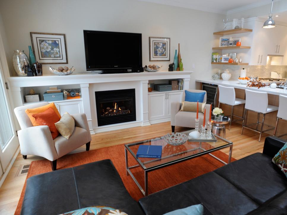 White Transitional Living Space With Orange Accents