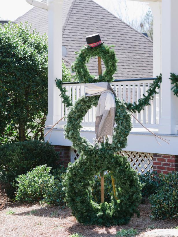 To amp up your holiday curb appeal designer Dan Faires makes a larger-than-life outdoor snowman from evergreen wreaths and basic lumber.