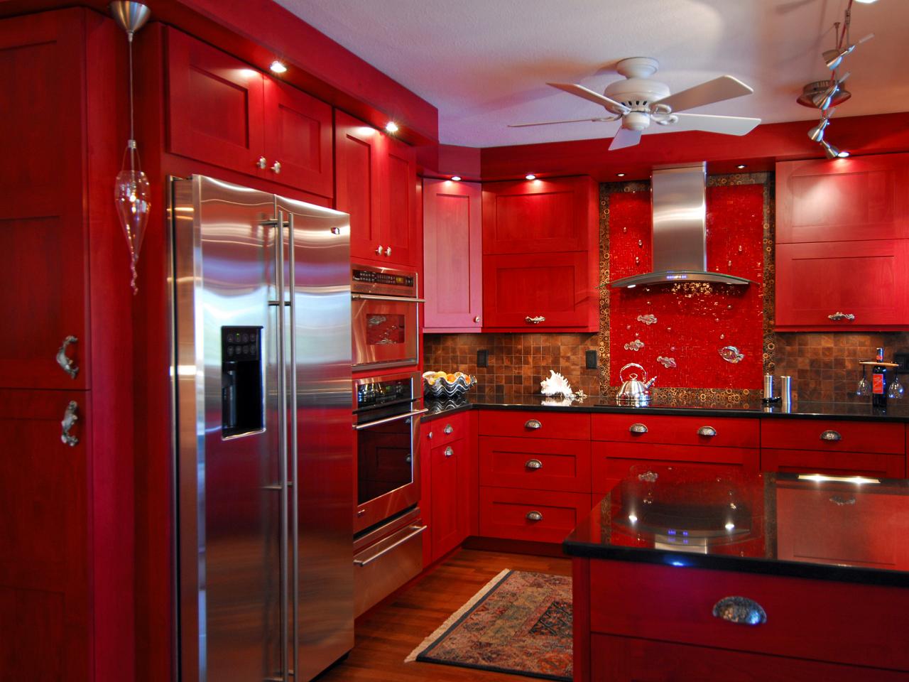 red wall and white cabinet in kitchen