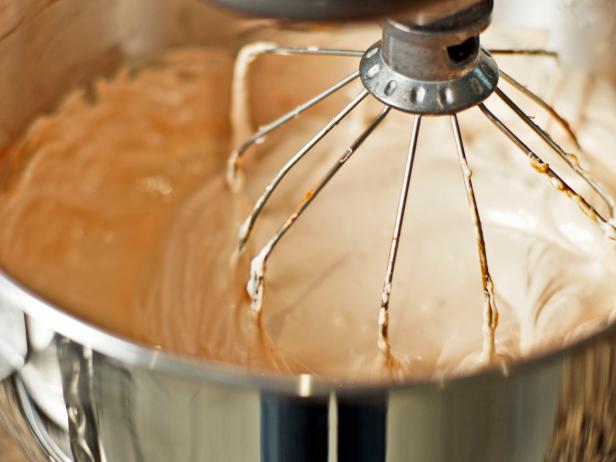 In step 5, add egg whites, vanilla, and 1/2 teaspoon of powdered food color to marshmallow mixture and beat just long enough to incorporate.