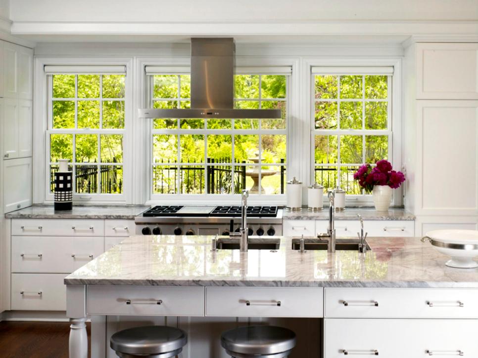 White Traditional Kitchen with Island and View