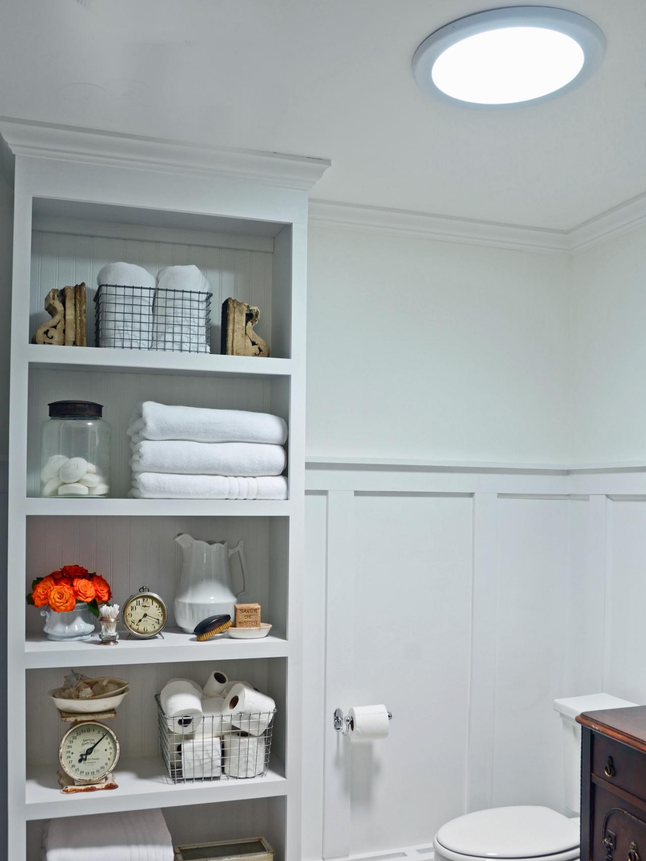 bathroom with skylight and built in shelving bring loads of natural 