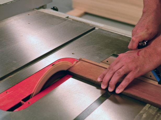 A vintage dresser drawer is cut for use in a DIY bathroom vanity.