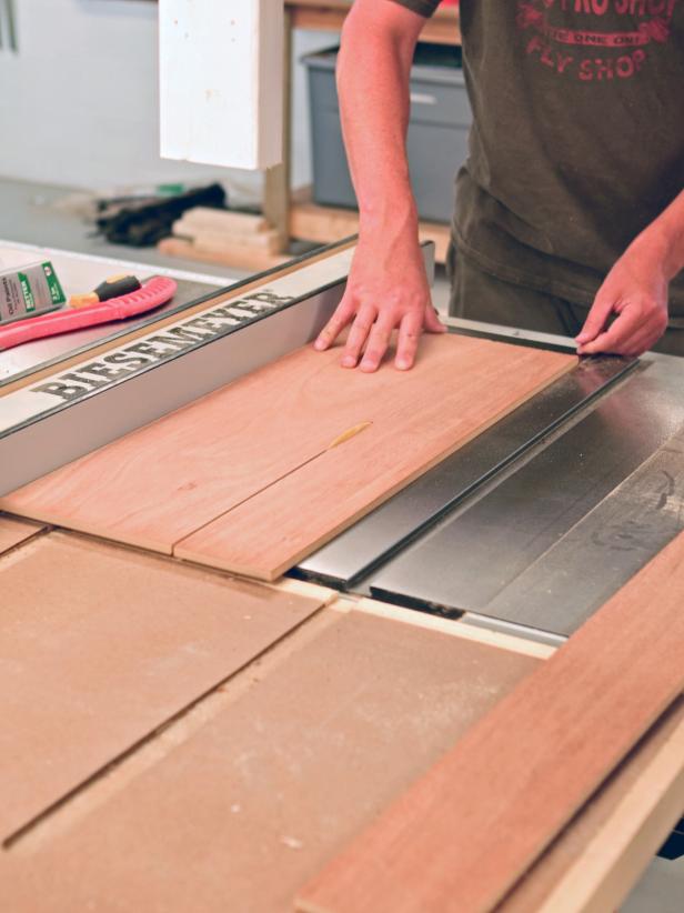 Interior sides and backs are cut for a DIY bathroom vanity.