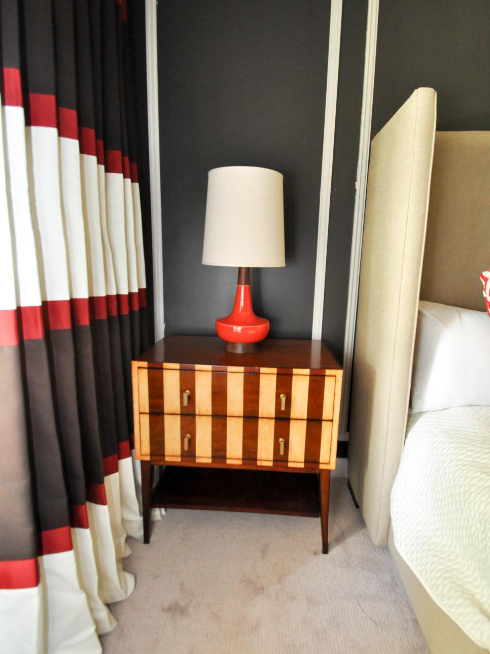 Black Eclectic Bedroom With Side Table and Striped Curtain