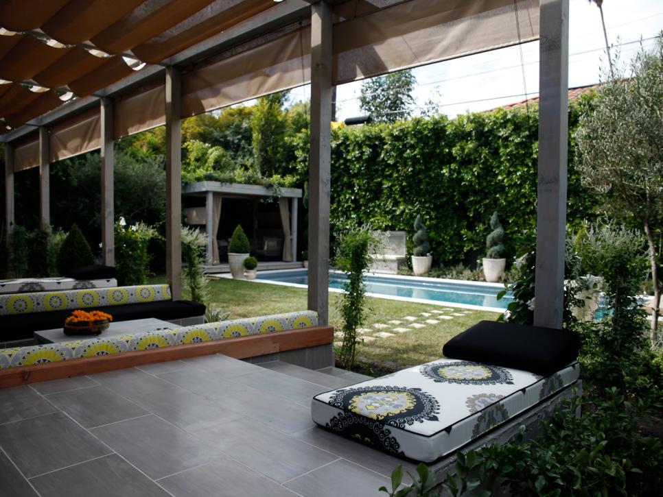 Covered Patio With Benches and Swimming Pool
