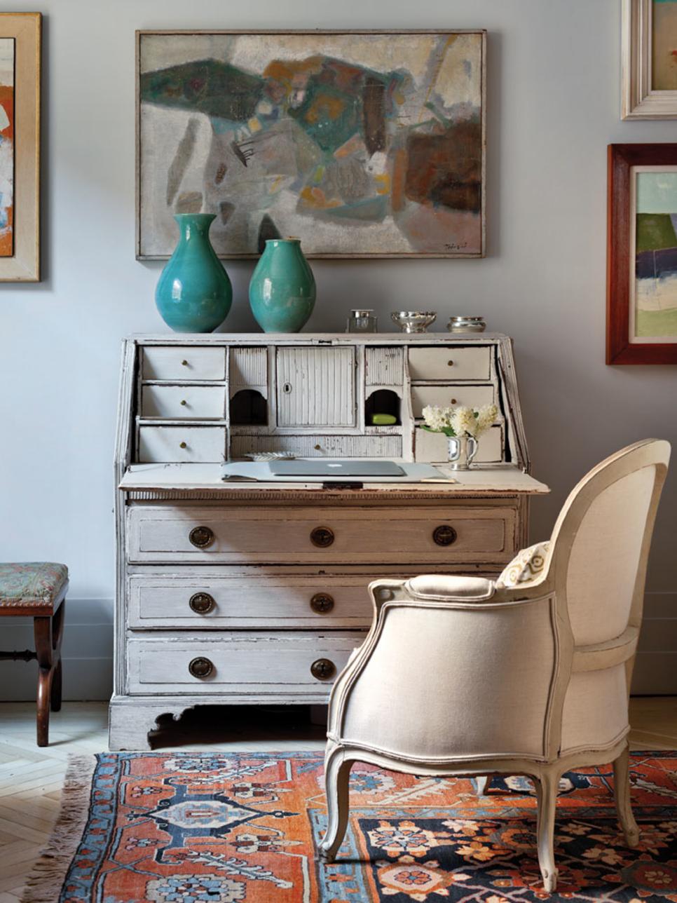 Office Space with Vintage-Inspired Furniture and Colorful Artwork