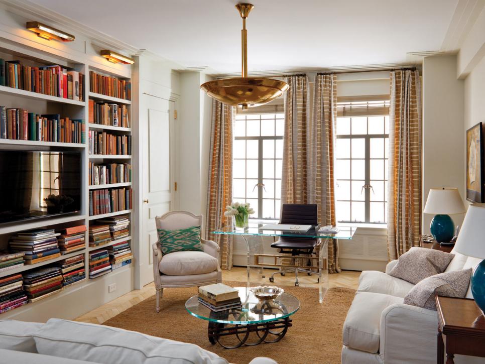 White Contemporary Living Space With Built-In Bookcase