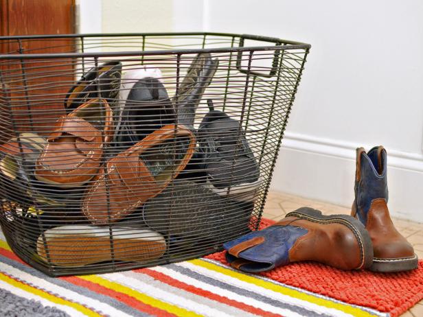 Black Wire Basket for Dirty Shoes on Striped Matt Black Wire Basket for Dirty Shoes on Striped Matt