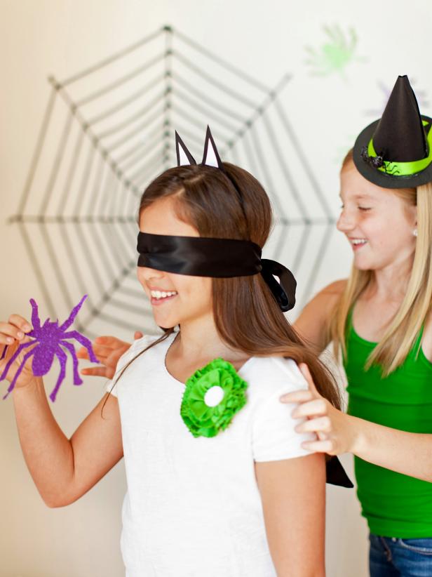 This fun "Pin the Spider on the Web" game proves that with a little time and creativity, you can turn everyday craft supplies into an interactive game that kids will love playing at your next Halloween party.