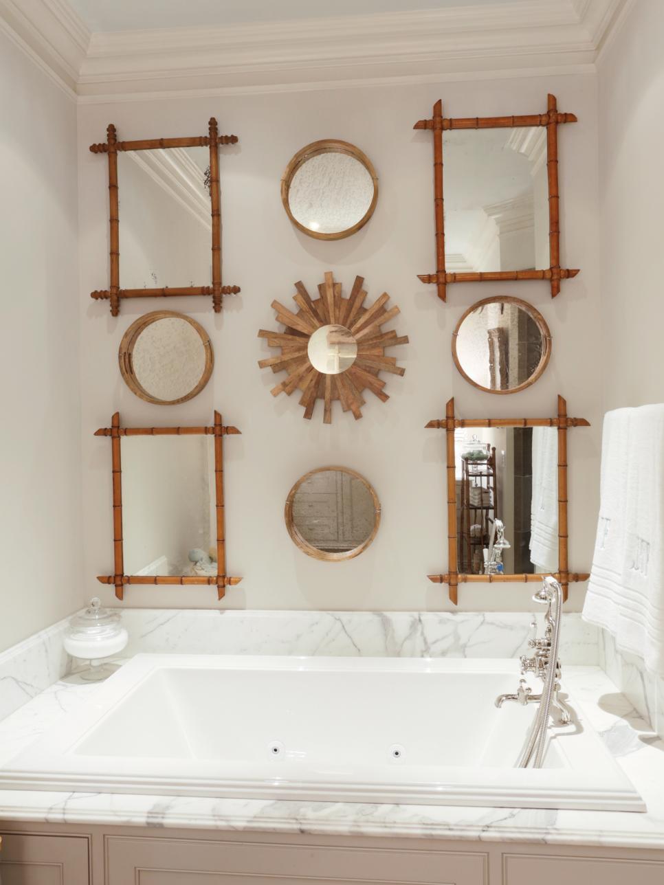 Bathroom With Large Bathtub and Bamboo Framed Mirrors