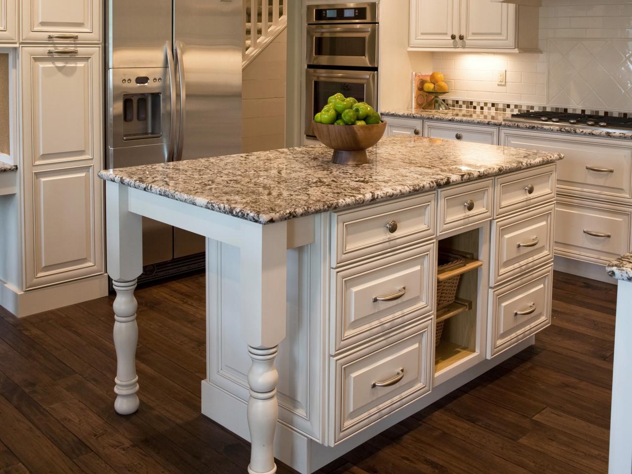 granite kitchen island attached to a wall