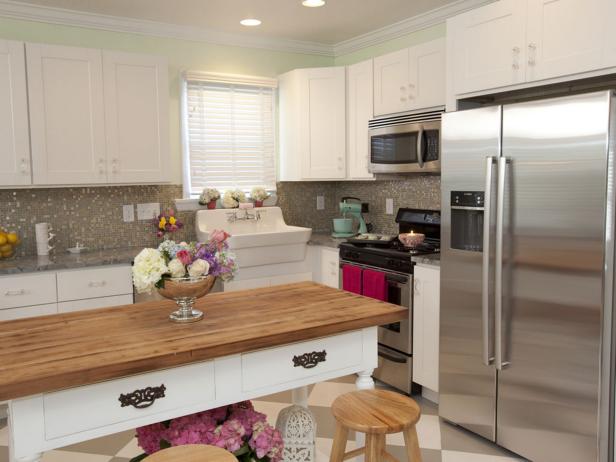 Green Shabby Chic Kitchen With White Cabinets and Antique Table