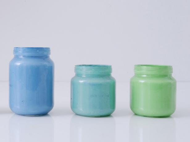 Mix the first section of paint until fully combined, then paint the inside of the largest jar. Repeat with the remaining two jars. Wait 24 hours for the paint to dry.