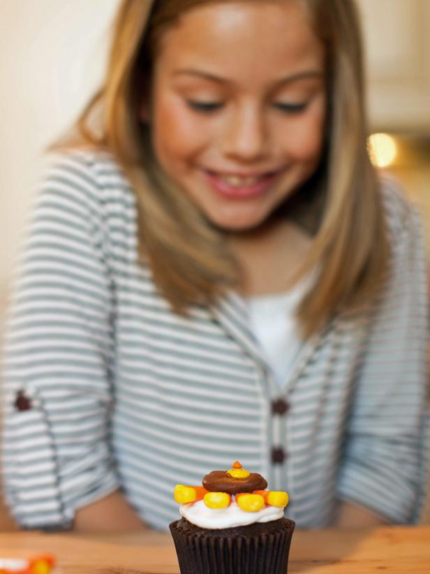 Kids of all ages will have a blast dressing up these plain cupcakes to resemble cute Thanksgiving turkeys. Make these treats a day before the big feast or make decorating the cupcakes part of your Turkey Day festivities.