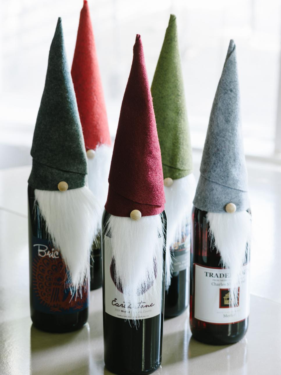 upcyled wine bottles to look like christmas elves