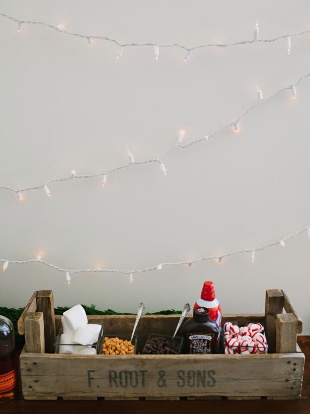 Drink station with hot chocolate toppings in vintage wooden box
