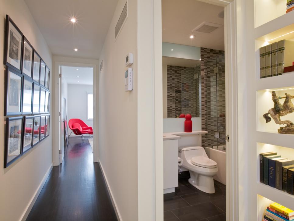 Narrow White Hallway Adjacent to Modern Bathroom