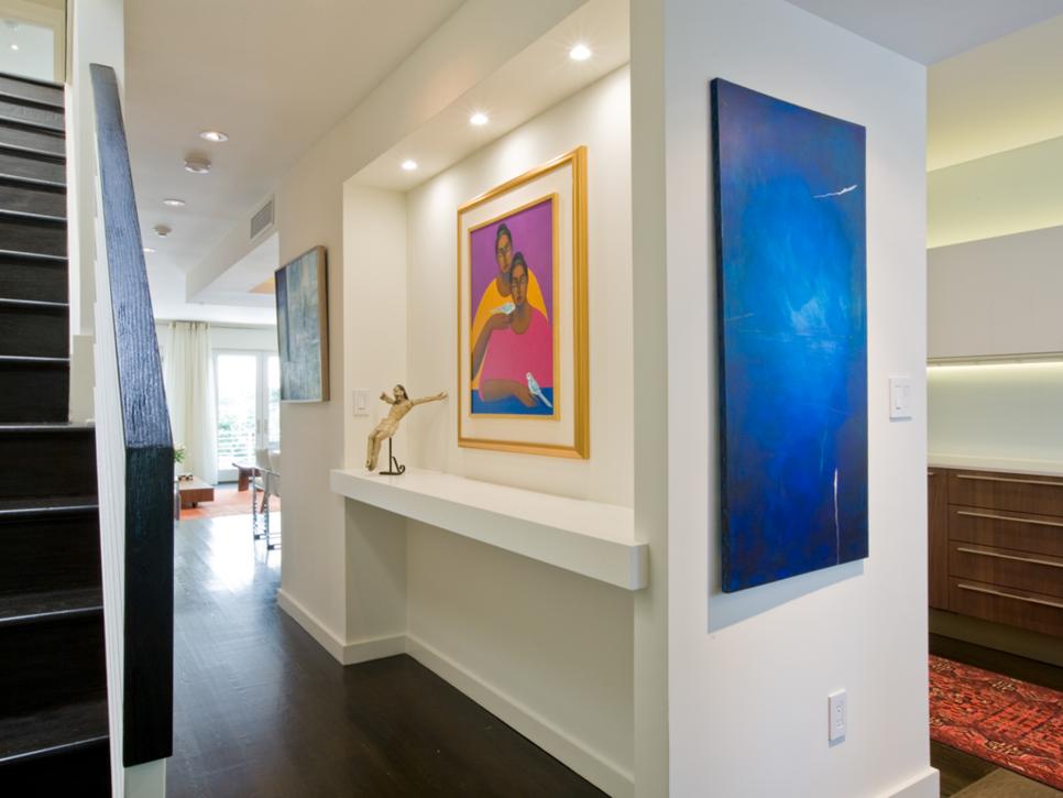 Modern White Hallway With Colorful Artwork