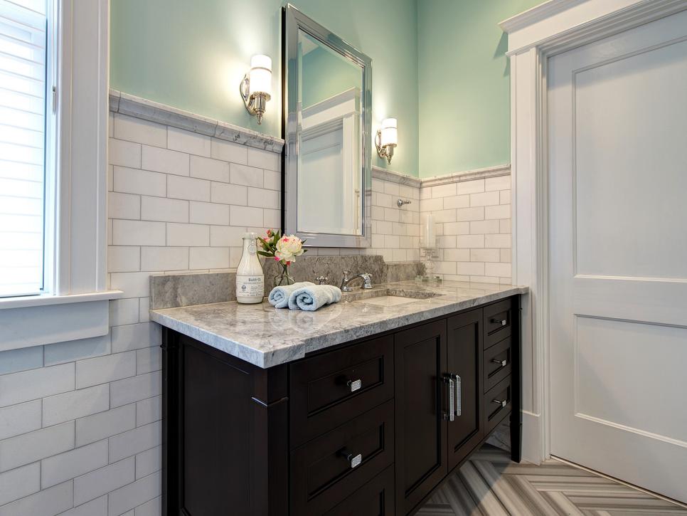 Eclectic Master Bathroom With Built-In Vanity and Tile Walls 