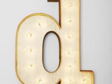 Marquee sign of a letter d for the wall of a child's bedroom.