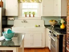 Light Blue Cottage Kitchen with Brick Wall
