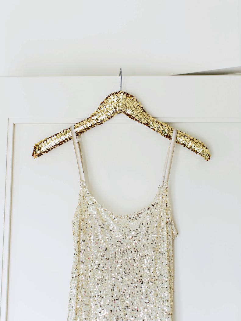 Give your ensemble the glamour it deserves by adorning a plain hanger with sequins, and letting your garb take center stage as you're preparing for the big night! Planning to have a group of girls over to get ready together? Offer these bedazzled hangers to display each guest’s outfit, then send them home as commemorative favors.
