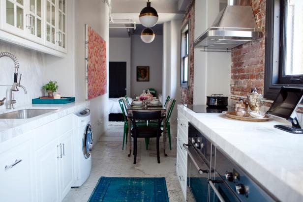 Galley Kitchen With Pendant Lights and Exposed Brick Galley Kitchen With Pendant Lights and Exposed Brick