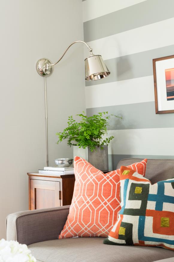 Chic Living Room With Gray and White Striped Accent Wall Chic Living Room With Gray and White Striped Accent Wall