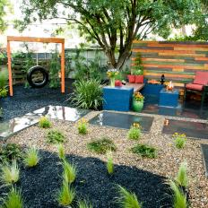 Eclectic Backyard With Tire Swing