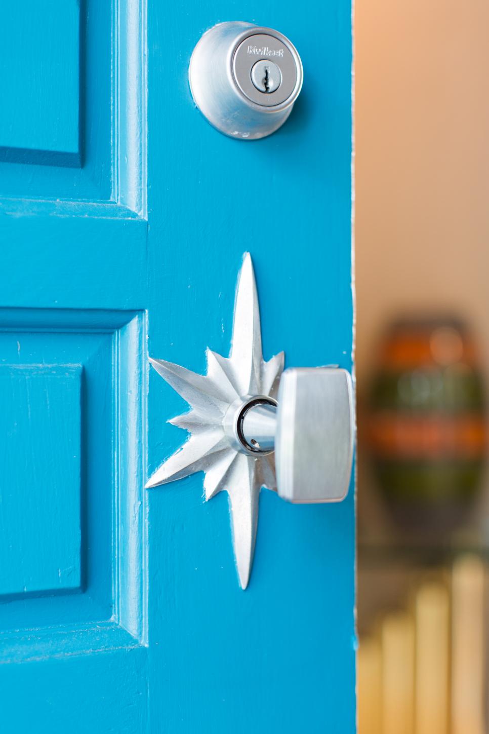 Bright Blue Front Door With Midcentury-Modern Doorknob Bright Blue Front Door With Midcentury-Modern-Inspired Doorknob