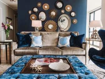 Eclectic Living Room With Custom Ottoman and Velvet Sofa and Chair