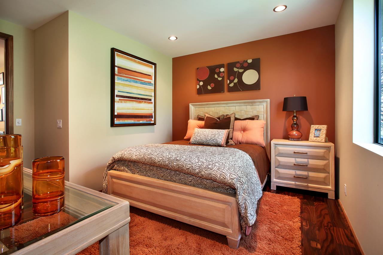 Orange Accent Wall Energizes Transitional Bedroom | HGTV