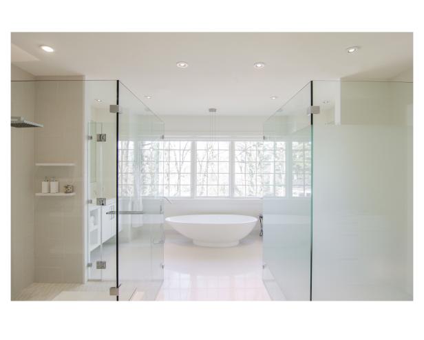 Sculpted Limestone Bathtub in White Modern Spa Bathroom Sculpted Limestone Bathtub in White Modern Spa Bathroom