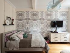 Studio Bedroom With Patterned Wallpaper and Soft Cream Walls