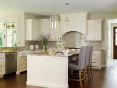 Transitional Kitchen With Eat-In Island and White Cabinets