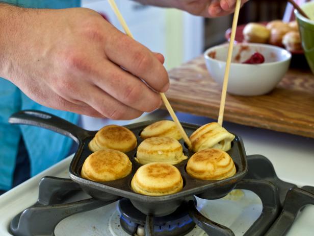 Flip doughnuts over until all edges are golden brown.