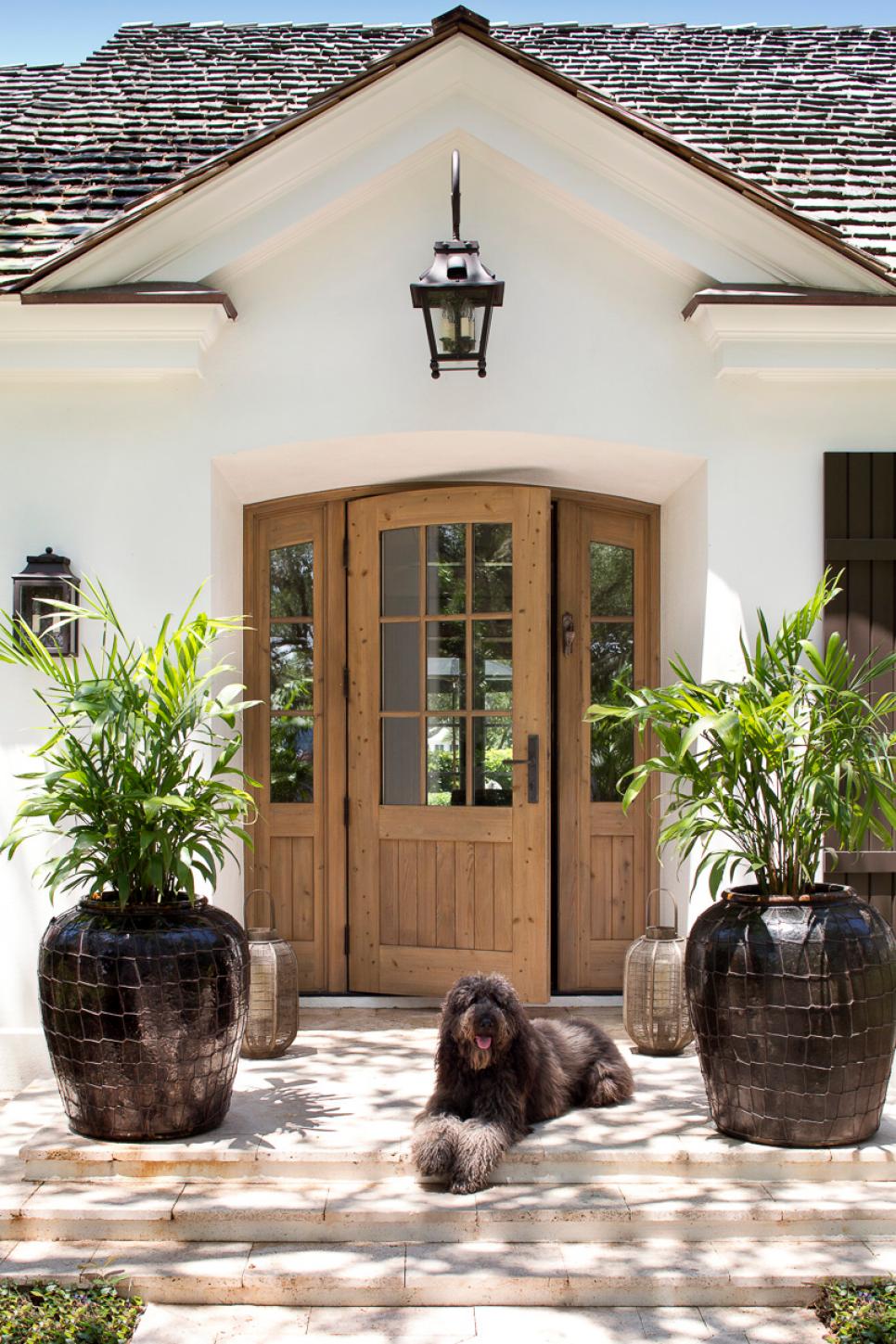 Tropical Home Entrance With Potted Plants White Beach House Entrance With Wood Front Door