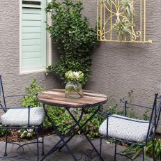 Small Table for Two in Quaint Courtyard