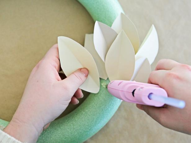Step 5: Start a second row that slightly overlaps the base of the first.