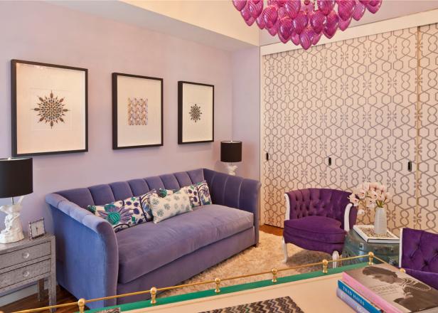 Eclectic Lavender Living Space With Velvety Sofa Purple Living Room With Purple Sofa, Chairs and Patterned Accent Wall