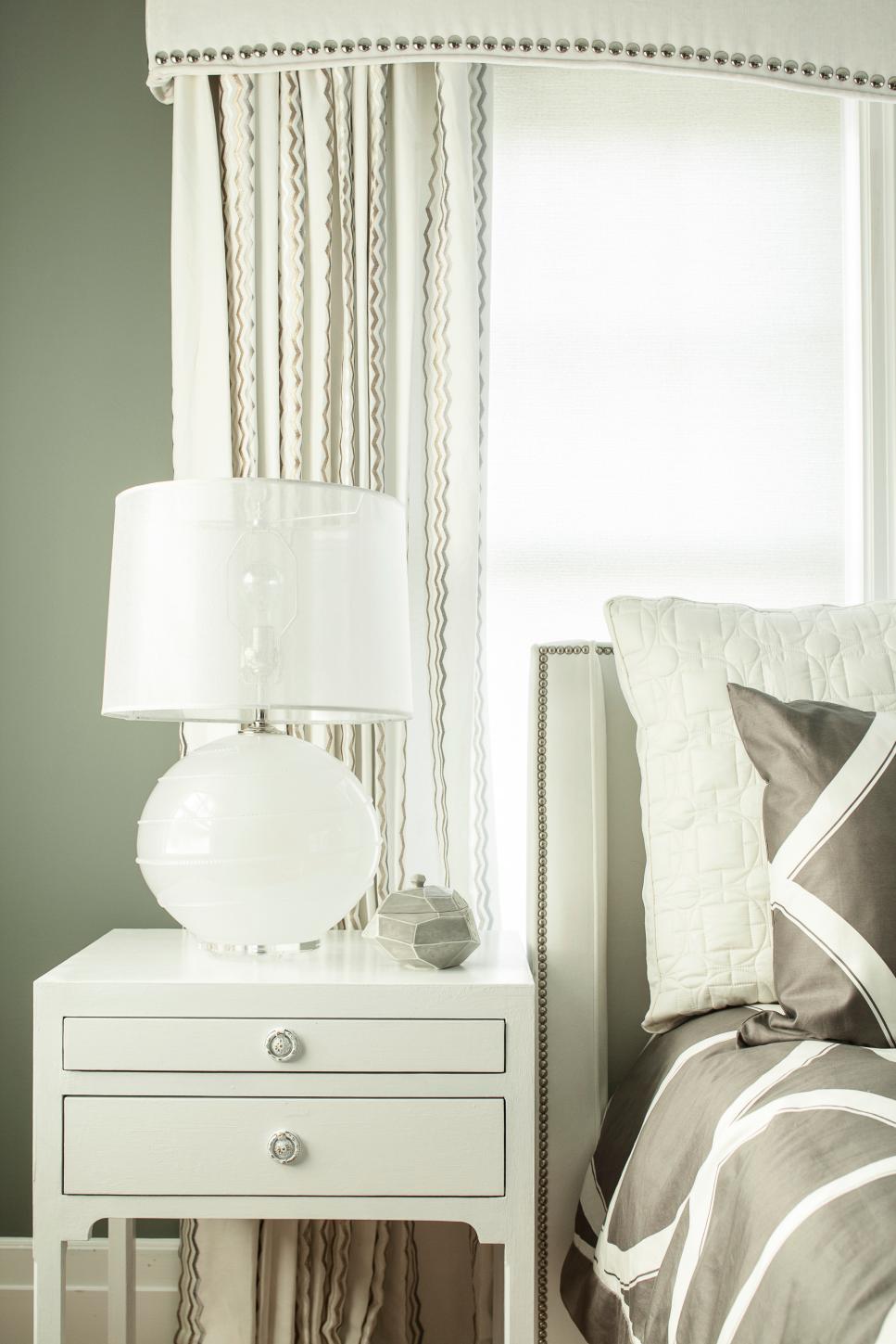 White Nightstand in Charcoal Gray Master Bedroom White Lamp on White Nightstand in Dark Gray Bedroom