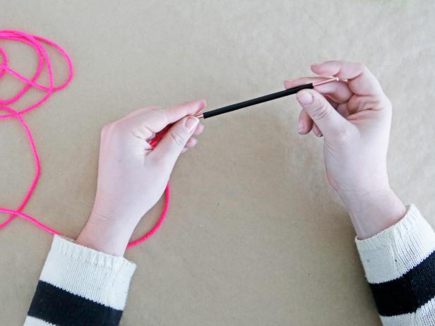 Step 3: String the first three pieces onto the crochet needle.