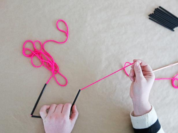 Step 3: String the first three pieces onto the crochet needle.